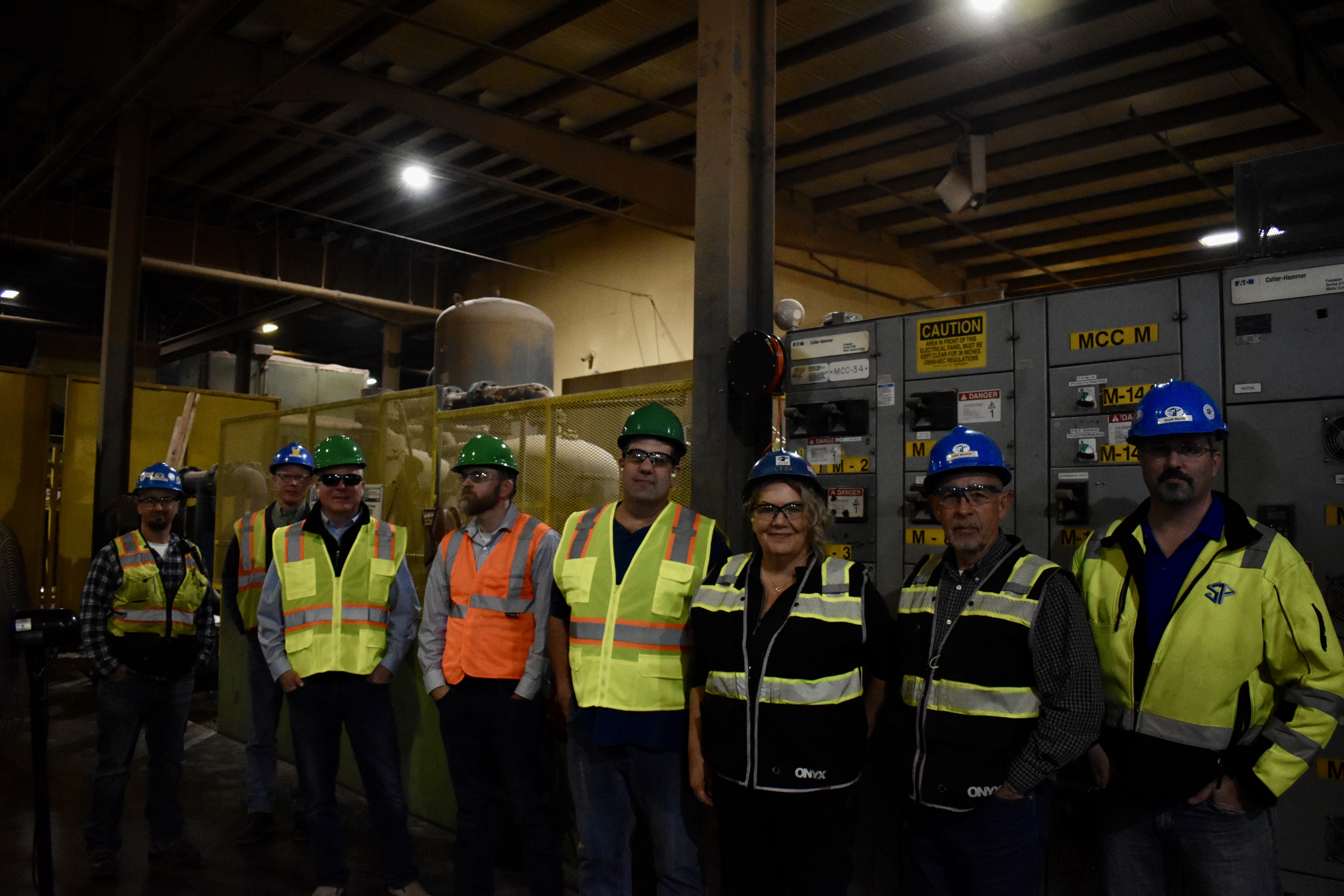 Employees of Sierra Pacific Industries in Centraila, Washington alongside representatives from the American Forest Resource Council at the mill, on April 7, 2022. Photo by Lauren Gallup.