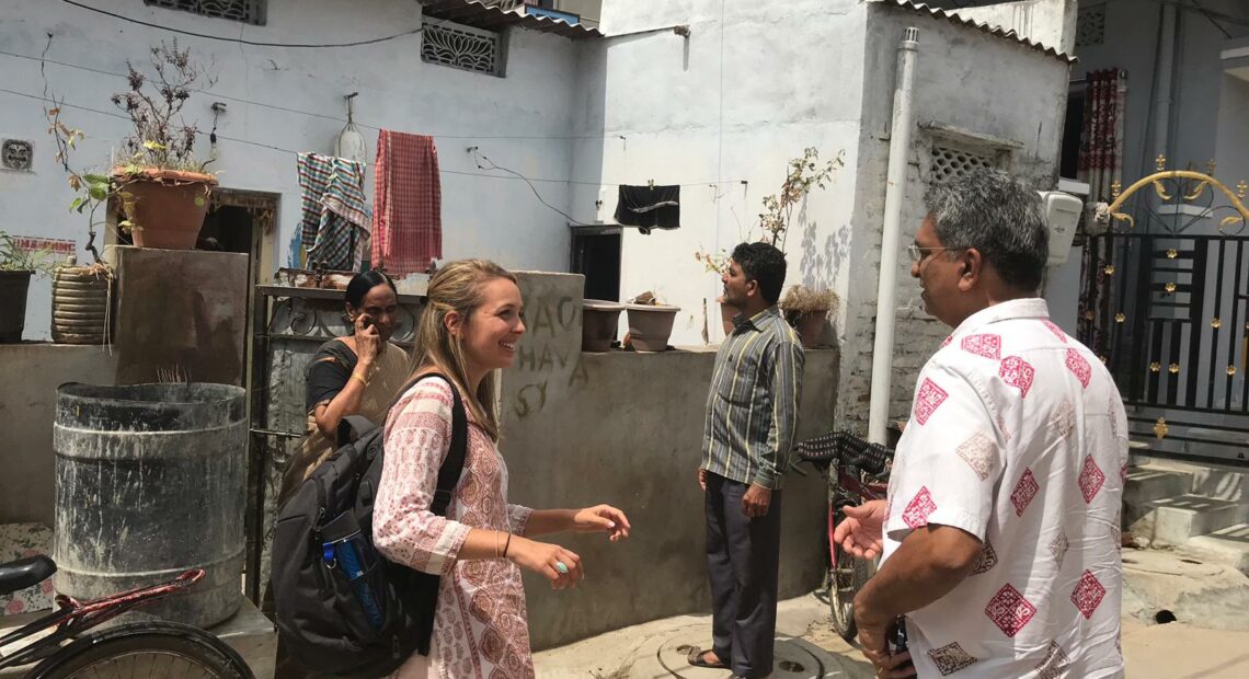 Eco-Shelter Inc. CEO and founder, Alexa Bednarz, talks with Dr. Vikram Yadama on a trip to India. Photo courtesy of Alexa Bednarz.