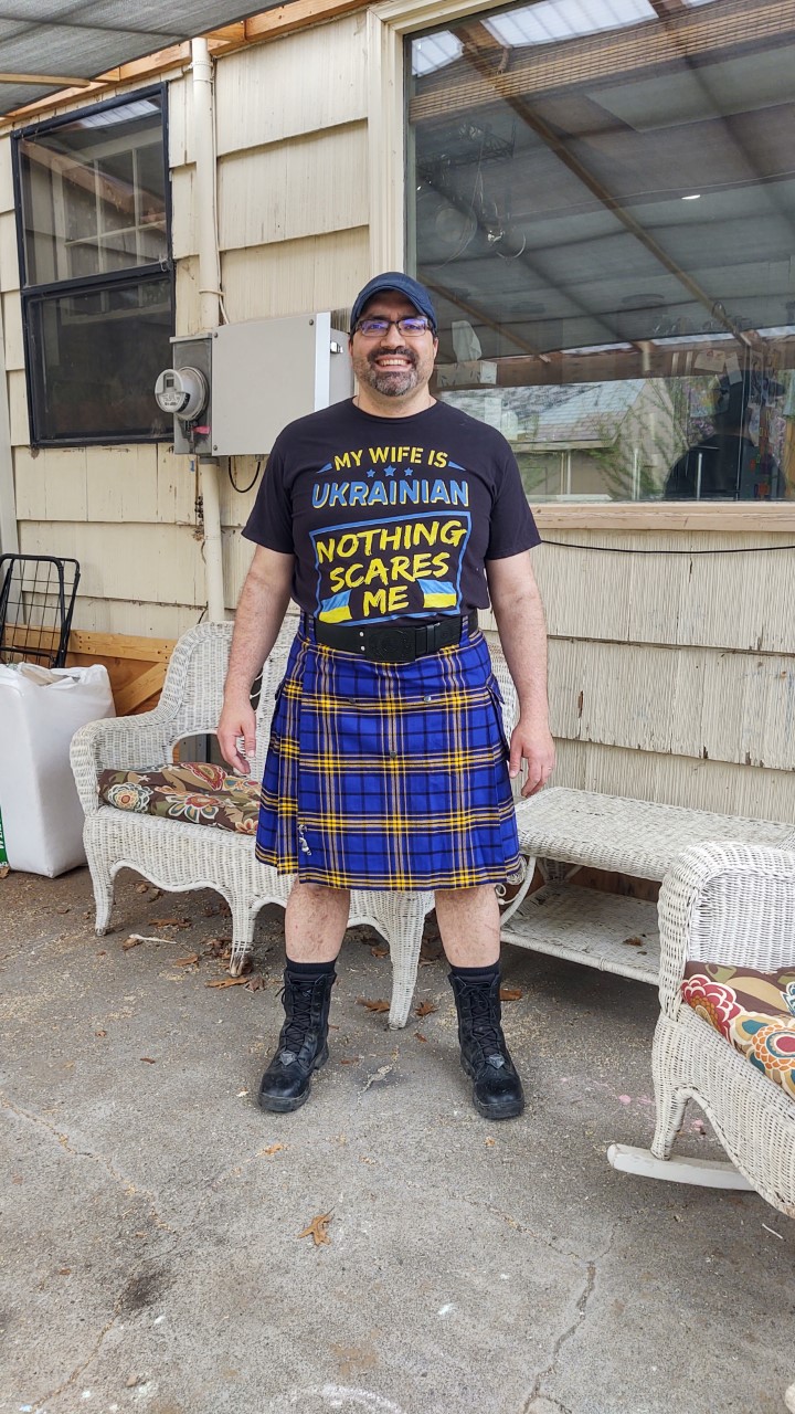 Kelly Clear models the kilt he and his wife Lidiya designed to sell to support humanitarian efforts in Ukraine. Photo courtesy of Kelly Clear.