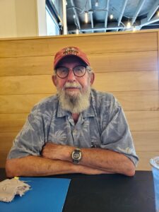 Older man in booth