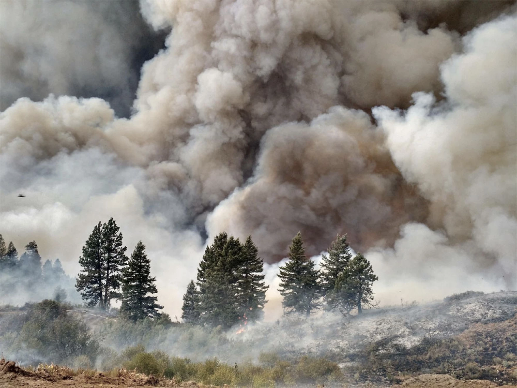 Smoke from a wildfire. It’s tough to keep wildfire smoke out of homes. Scientists at Pacific Northwest National Laboratory give some practical tips to help.