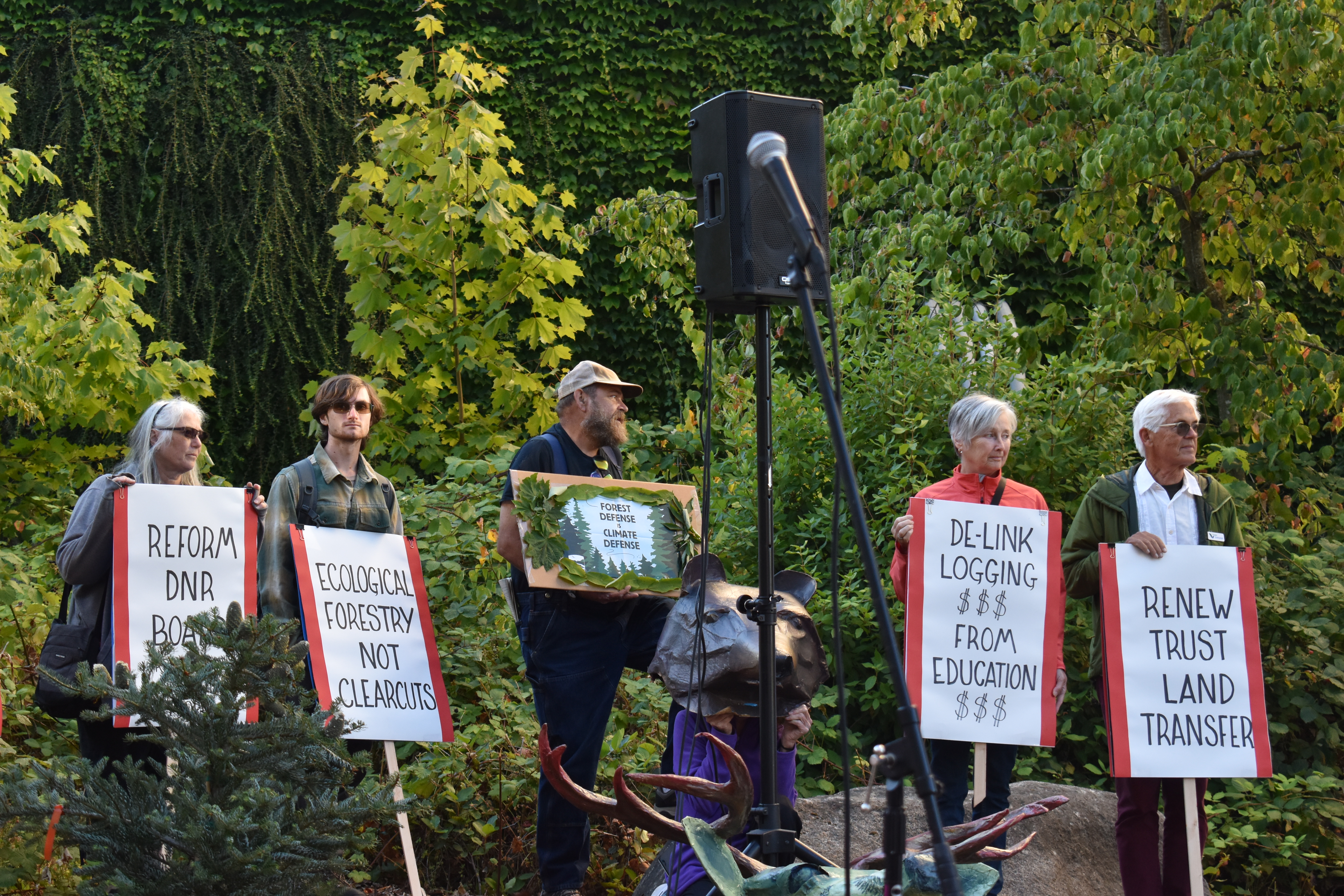 Activists hold signs with demands for the Board of Natural Resources at the rally on September 6th. Photo by Lauren Gallup.