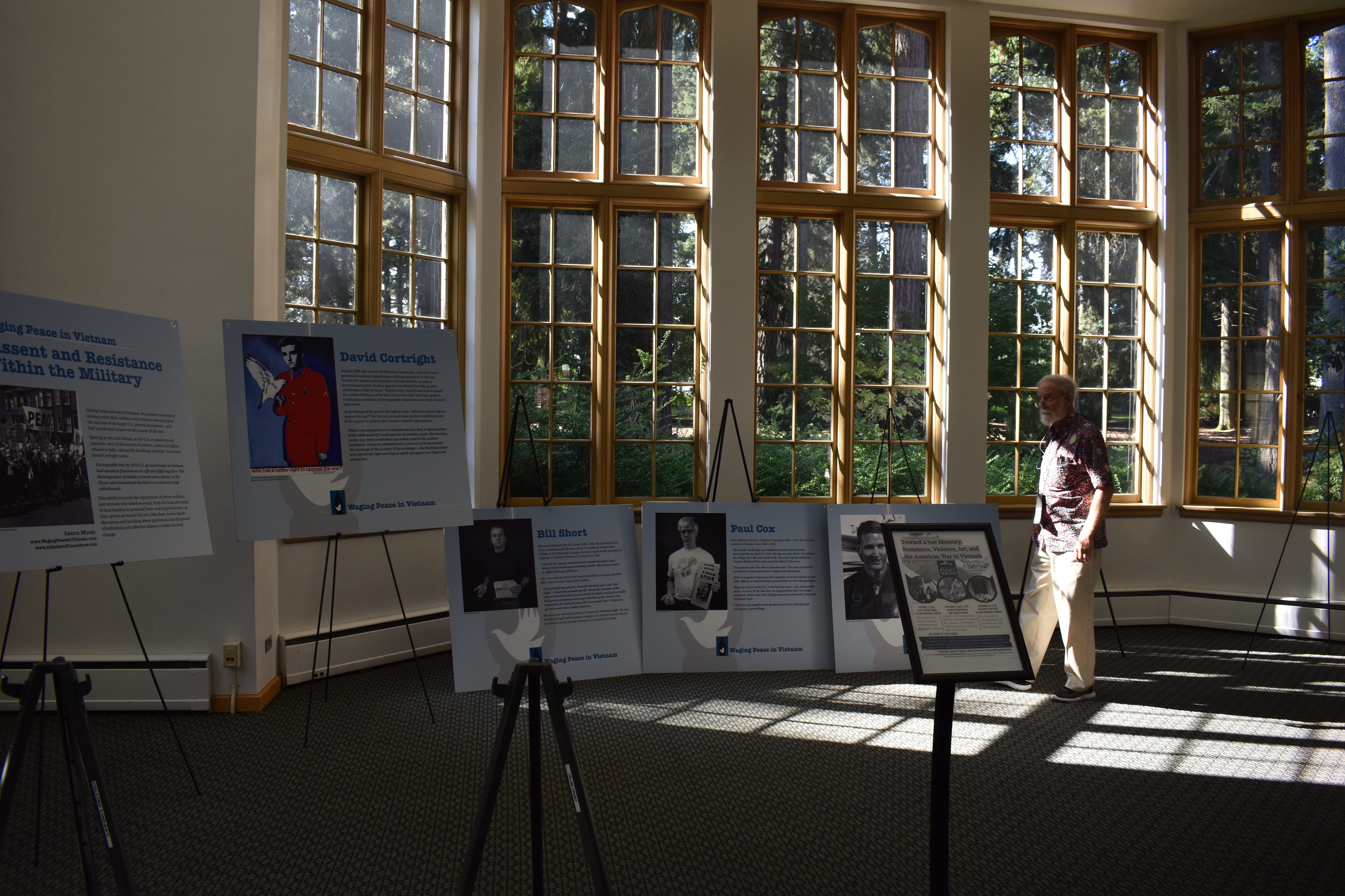 David Dittemore joined Ron Carver to install the exhibit at the University of Puget Sound. Photo by Lauren Gallup.
