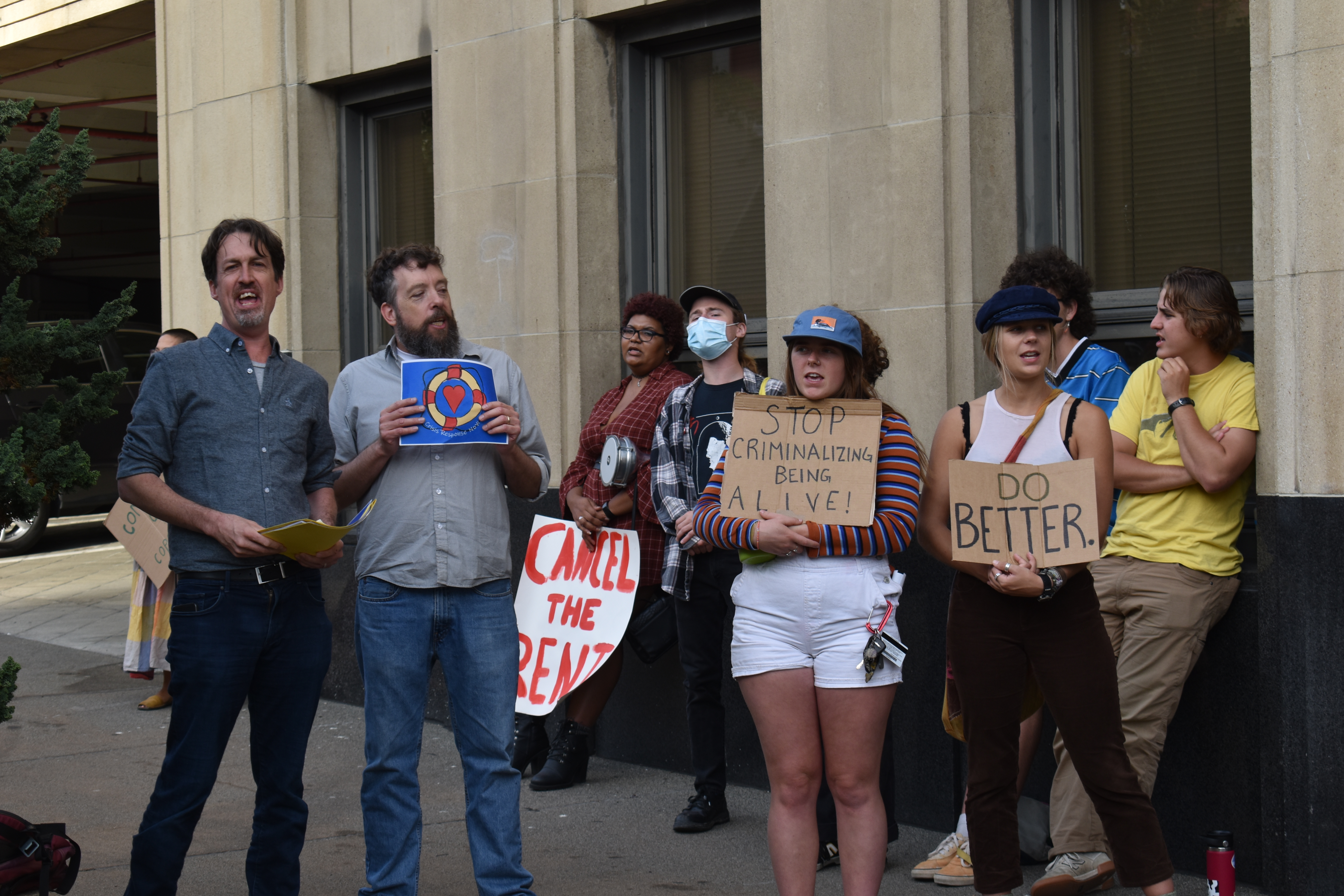 Protestors chant outside the Tacoma municipal building in their opposition to a proposed camping ban in the city. Photo by Lauren Gallup.