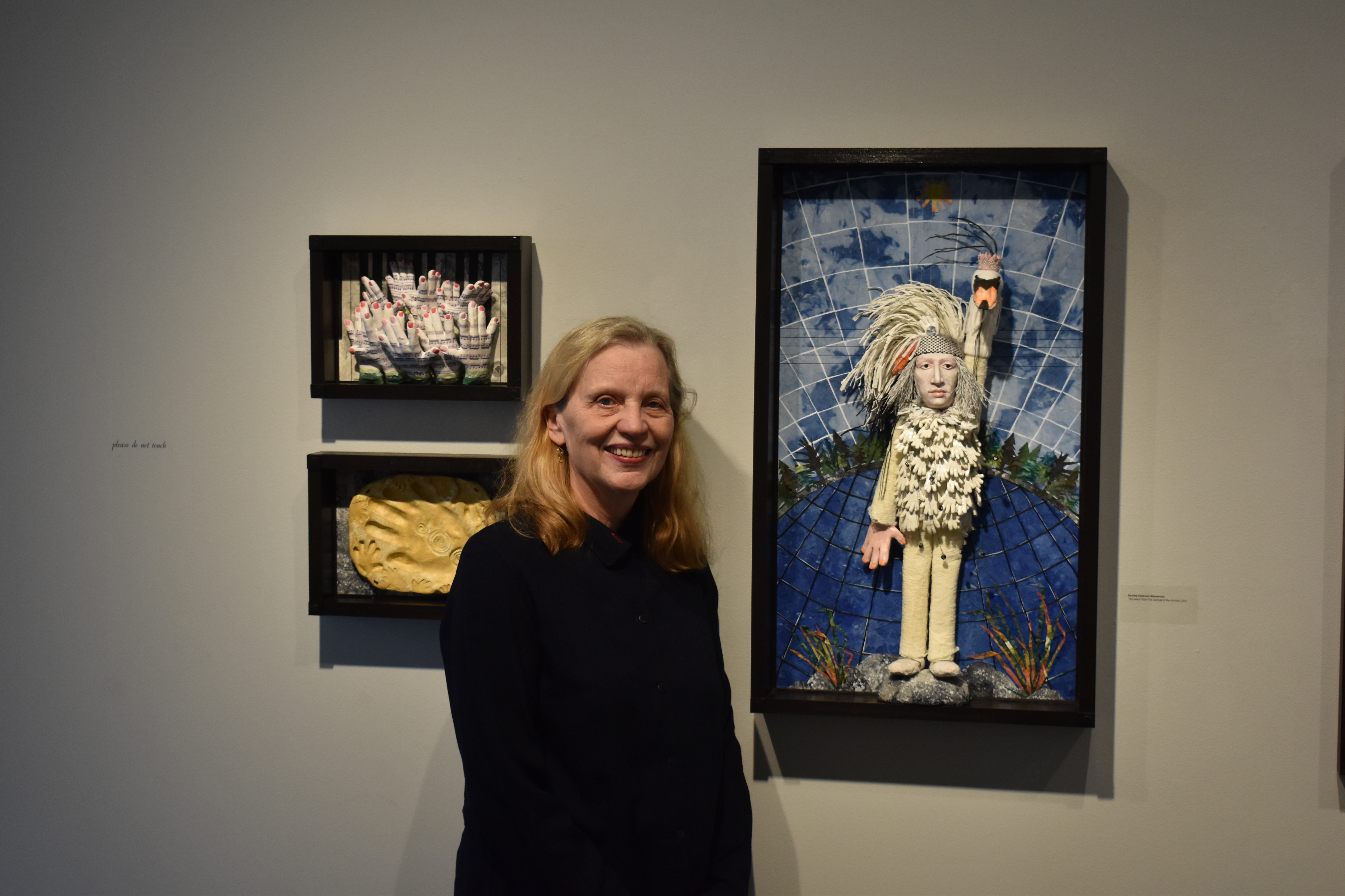 Artist Dorothy Anderson Wasserman next to "The Swan," which she fashioned as a self portrait. Photo by Lauren Gallup.