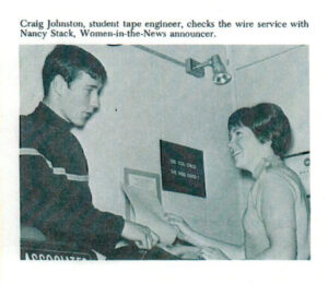 Craig Johnston, student tape engineer, checks the wire service with Nancy Stack, Women-in-the-news announcer.