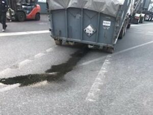 The leaking container upon arrival at Clean Earth's Tacoma facility. Photo courtesy of the Washington Department of Ecology.
