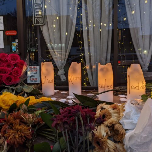 Flowers and candles at a vigil