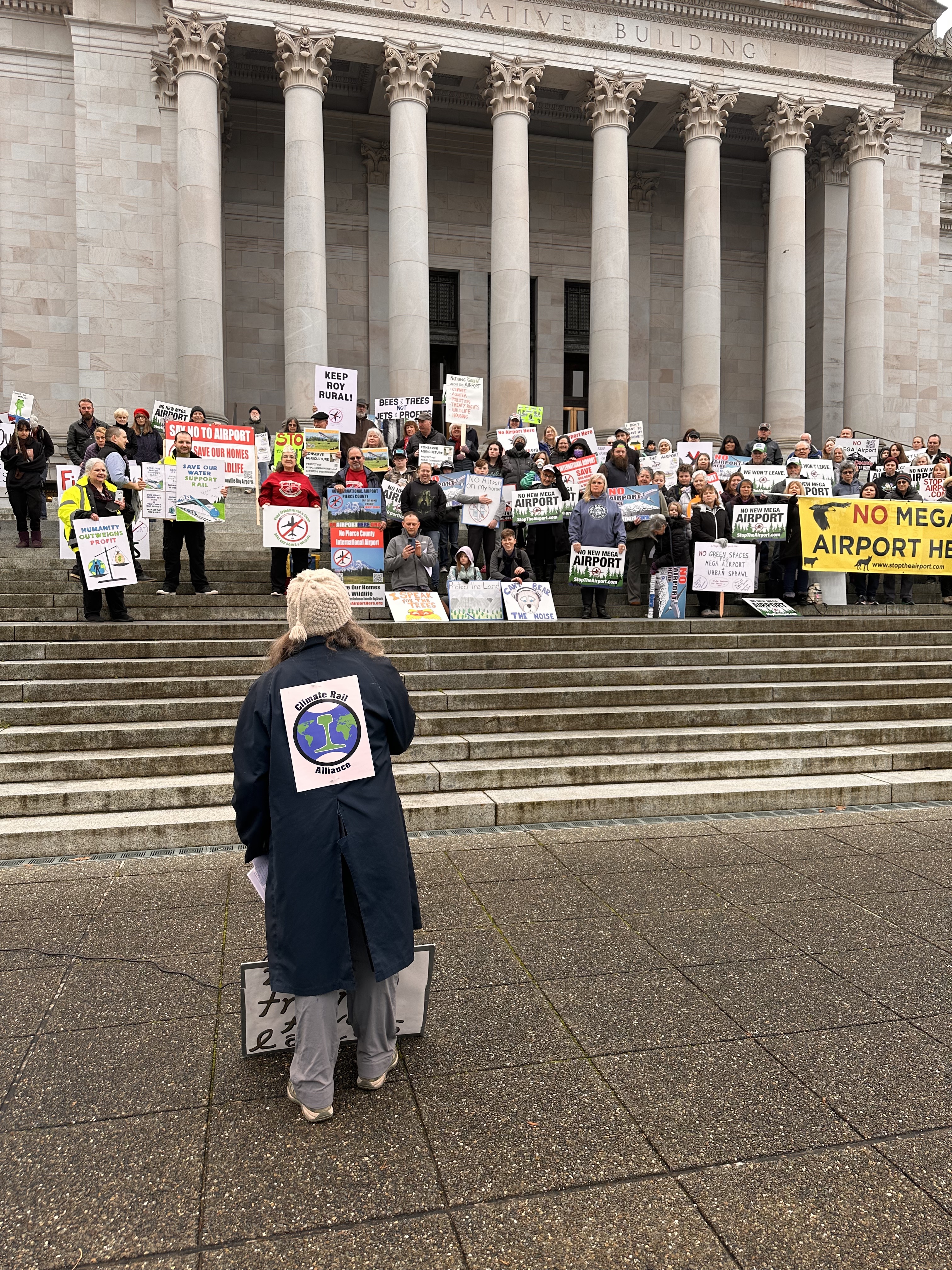 Mary Patterson of Climate Rail Alliance addresses the crowd on Wednesday. Photo by Lauren Gallup.