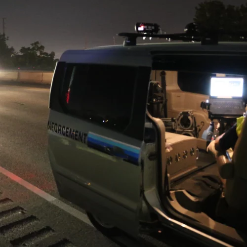 An officer works in a speed enforcement van along I-5 in Medford during construction in 2018. The effort to slow drivers nabbed one speeder going 91 mph in the 40 mph work zone