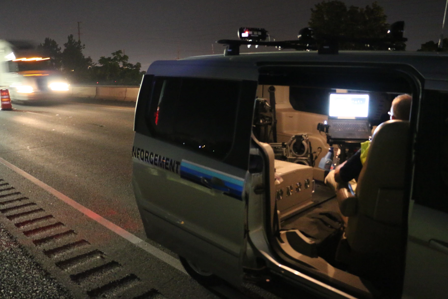An officer works in a speed enforcement van along I-5 in Medford during construction in 2018. The effort to slow drivers nabbed one speeder going 91 mph in the 40 mph work zone