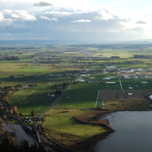 Conversations with farmers in the Skagit Valley, seen here from Samish Overlook, inspired a Democratic state legislator to propose to bar foreign entities from buying Washington croplands
