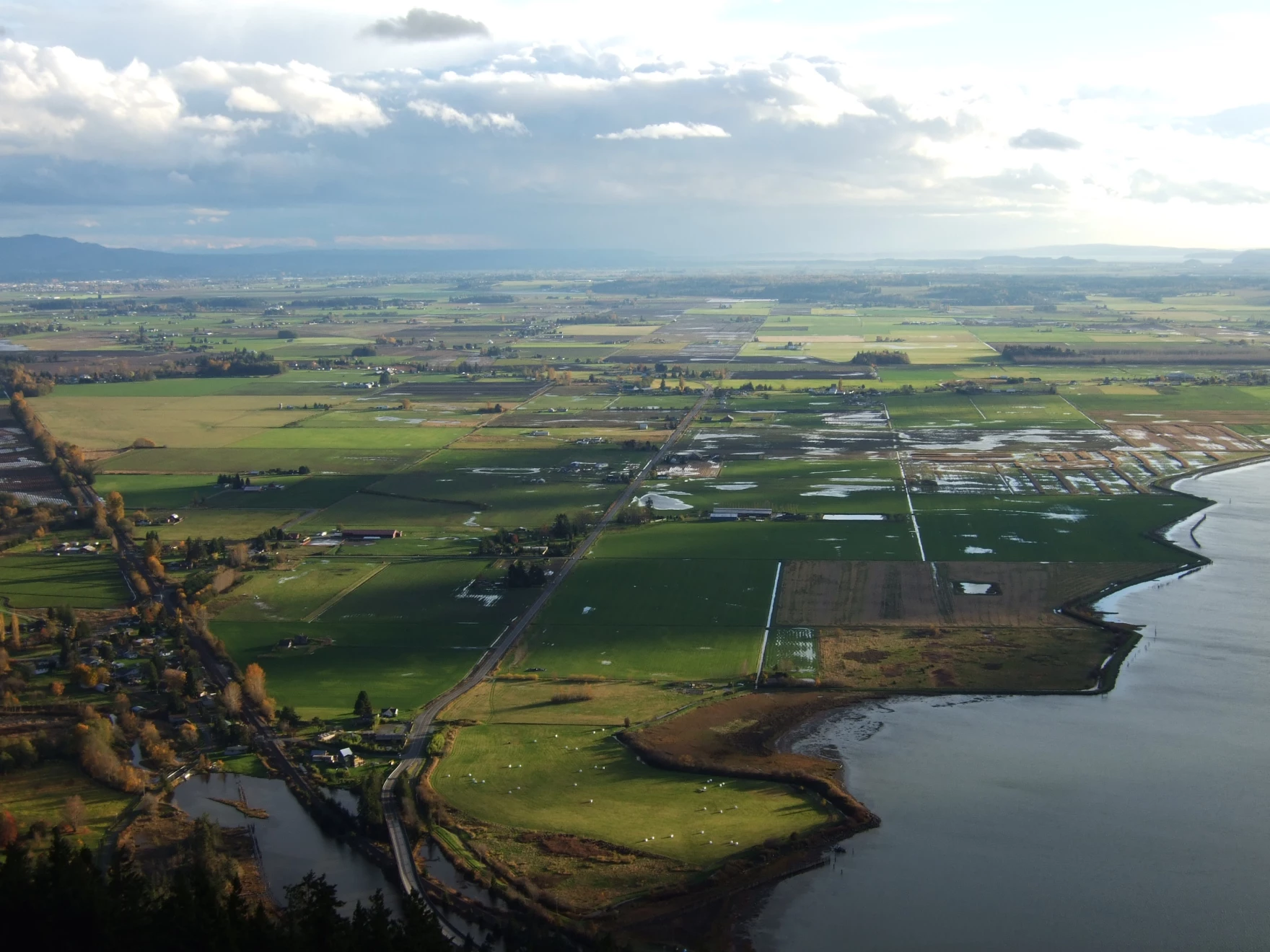 Conversations with farmers in the Skagit Valley, seen here from Samish Overlook, inspired a Democratic state legislator to propose to bar foreign entities from buying Washington croplands