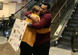 Claudia Cifuentes with Kevin Loza at Seattle Airport.