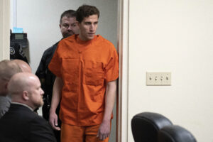 Bryan Kohberger walks into the Latah County Courtroom with an orange jumpsuit on.