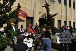 On May 25, a number of supporters of the Tacoma For All initiative for tenant protections, rallied in front of the City Hall building. Photo by Lauren Gallup.