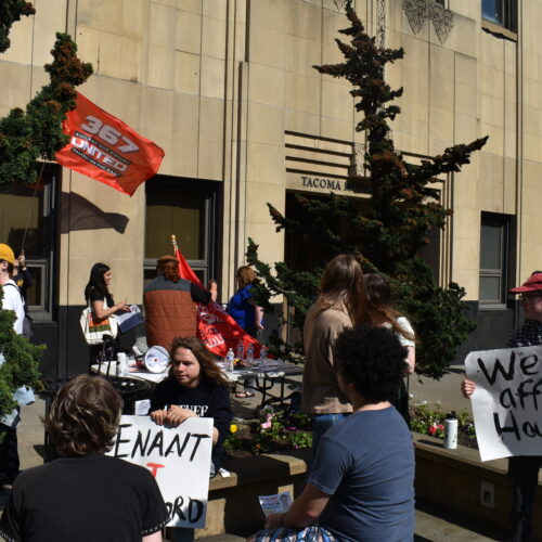 On May 25, a number of supporters of the Tacoma For All initiative for tenant protections, rallied in front of the City Hall building. Photo by Lauren Gallup.