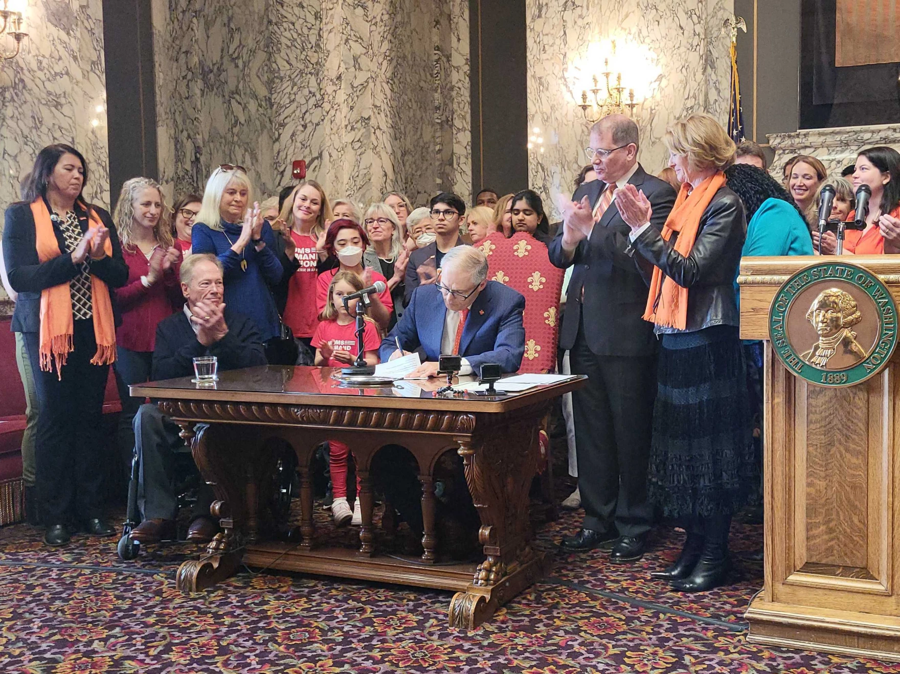 Washington Gov. Jay Inslee signed three new gun bills into law Tuesday, including an assault weapons ban that takes immediate effect