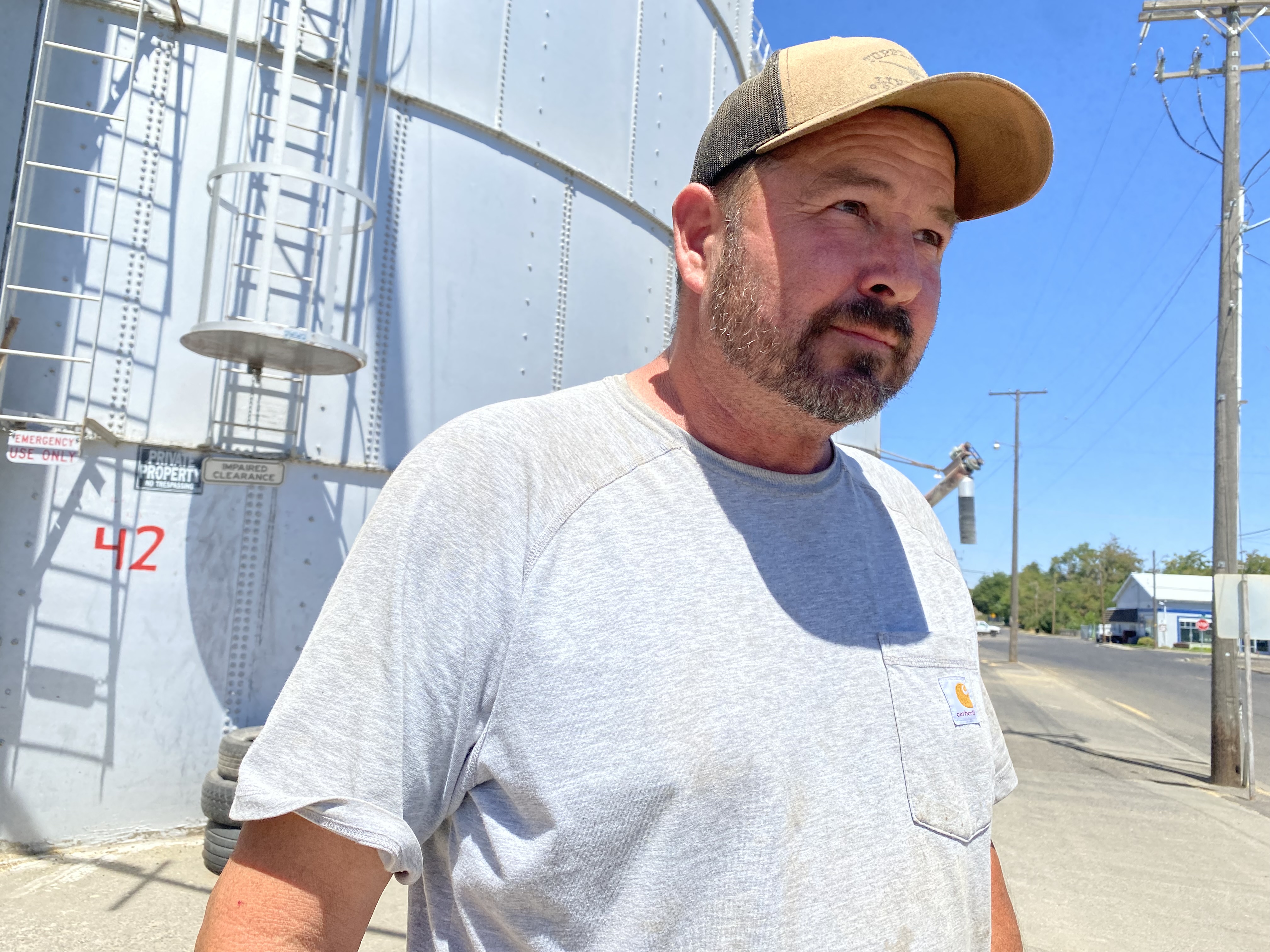 Jeff Leber farms soft white wheat out of Umapine, Oregon. He was dropping a load during harvest at the elevator in Walla Walla (Credit: Anna King / Northwest News Network) 