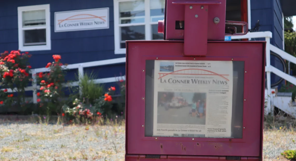 Newspaper boxes like this one sitting outside of the La Conner Weekly News' office can be seen scattered across the two main streets of La Conner, stocked with new editions of the paper every week. It costs $1.25 for a copy.