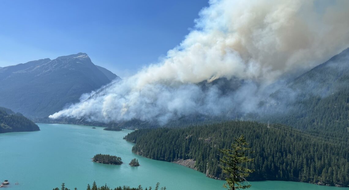 Aerial view of the Sourdough Fire burning in Whatcom County. Credit: InciWeb