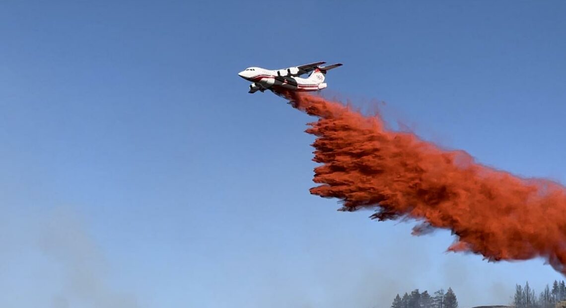 A Very Large Air Tanker dropping retardant on the Eagle Bluff Fire, burning in Okanogan County. // Credit: InciWeb