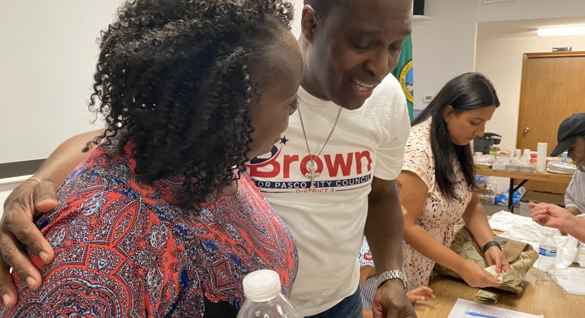 Incumbent Pasco City Councilmember Irving Brown has been targeted by racist letters, a knocked down campaign sign and vandalism in his yard. His supporters held a rally in Pasco on Tuesday evening.