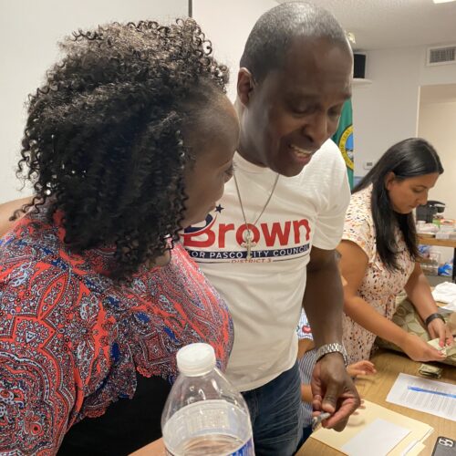 Incumbent Pasco City Councilmember Irving Brown has been targeted by racist letters, a knocked down campaign sign and vandalism in his yard. His supporters held a rally in Pasco on Tuesday evening.