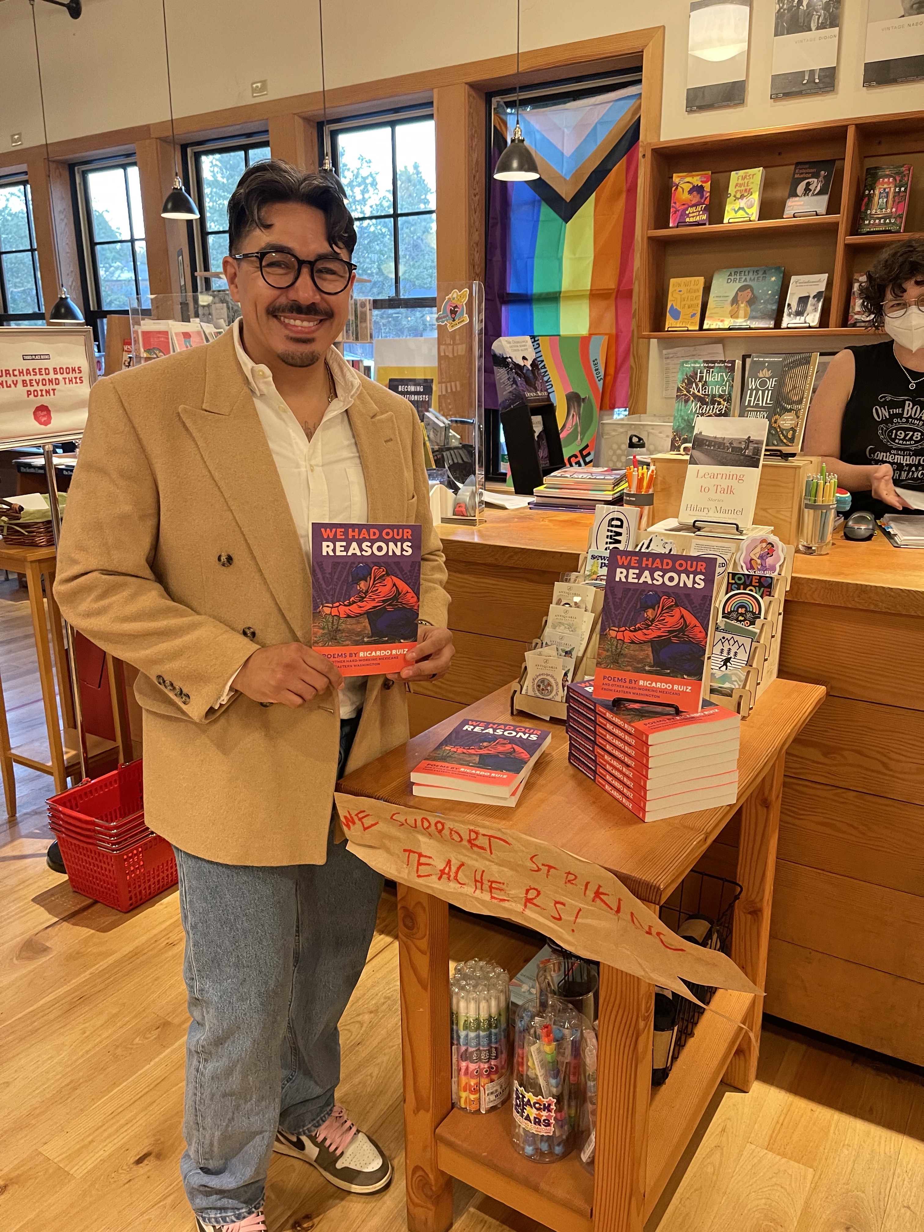 Poet Ricardo Ruiz displays his collection of poems, winner of the 2023 Washington State Book Award for poetry. // Courtesy of the author.