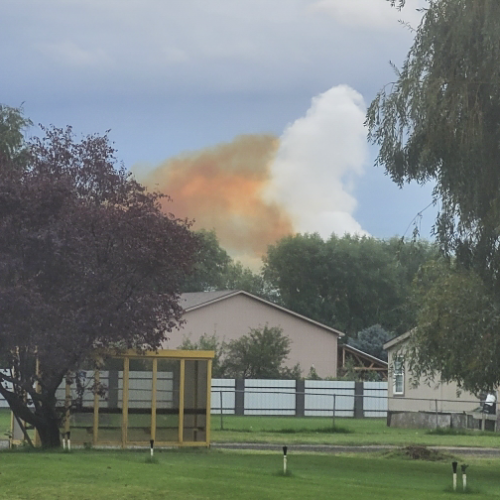 A mustard-yellow cloud forms above Finley, Washington. The chemical was nitric acid and was released by a fertilizer factory.