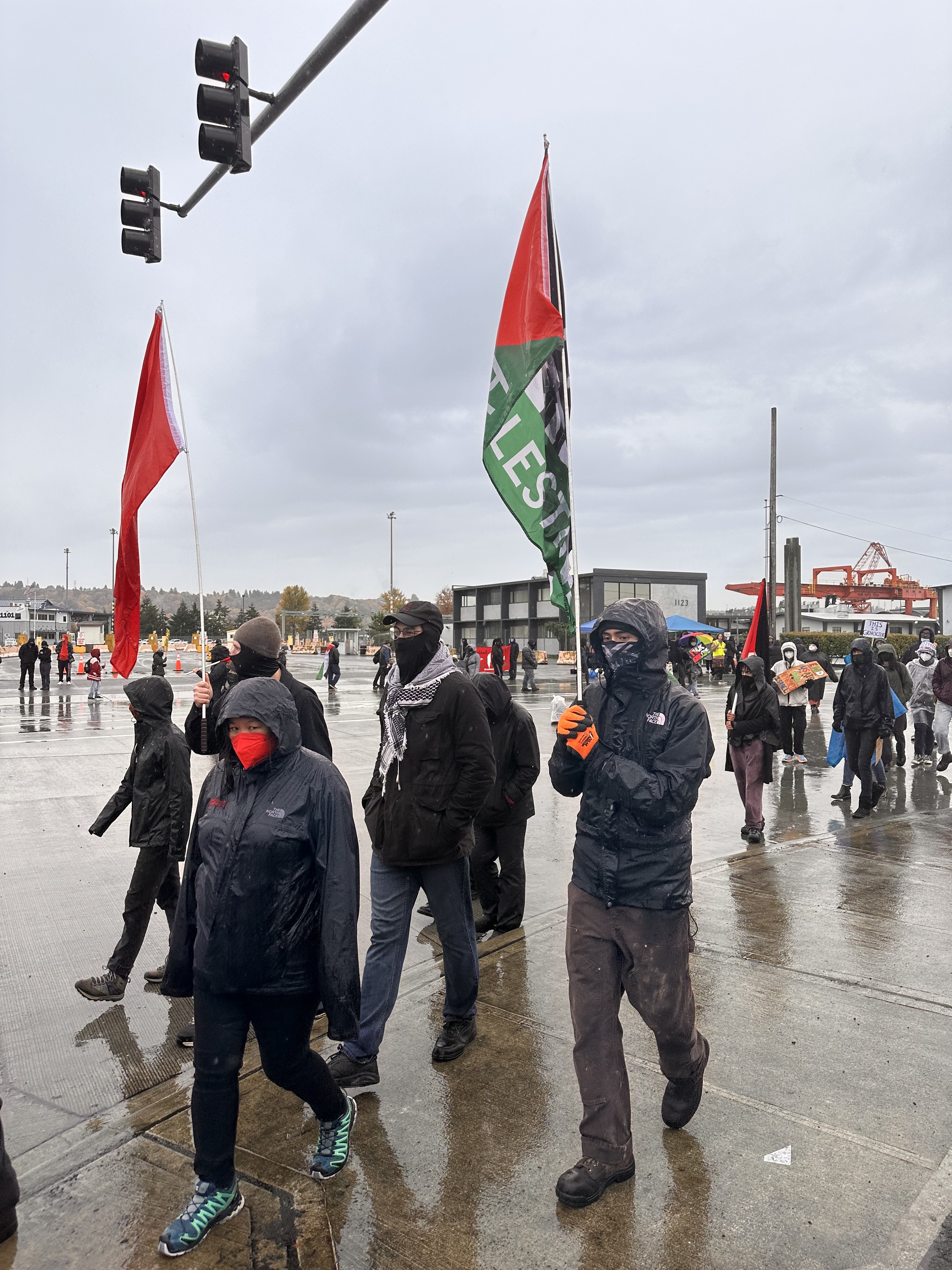 Protestors are keeping workers out from the Port of Tacoma. Multiple car blockades have been formed to impede road access. (Credit: Lauren Gallup / NWPB)