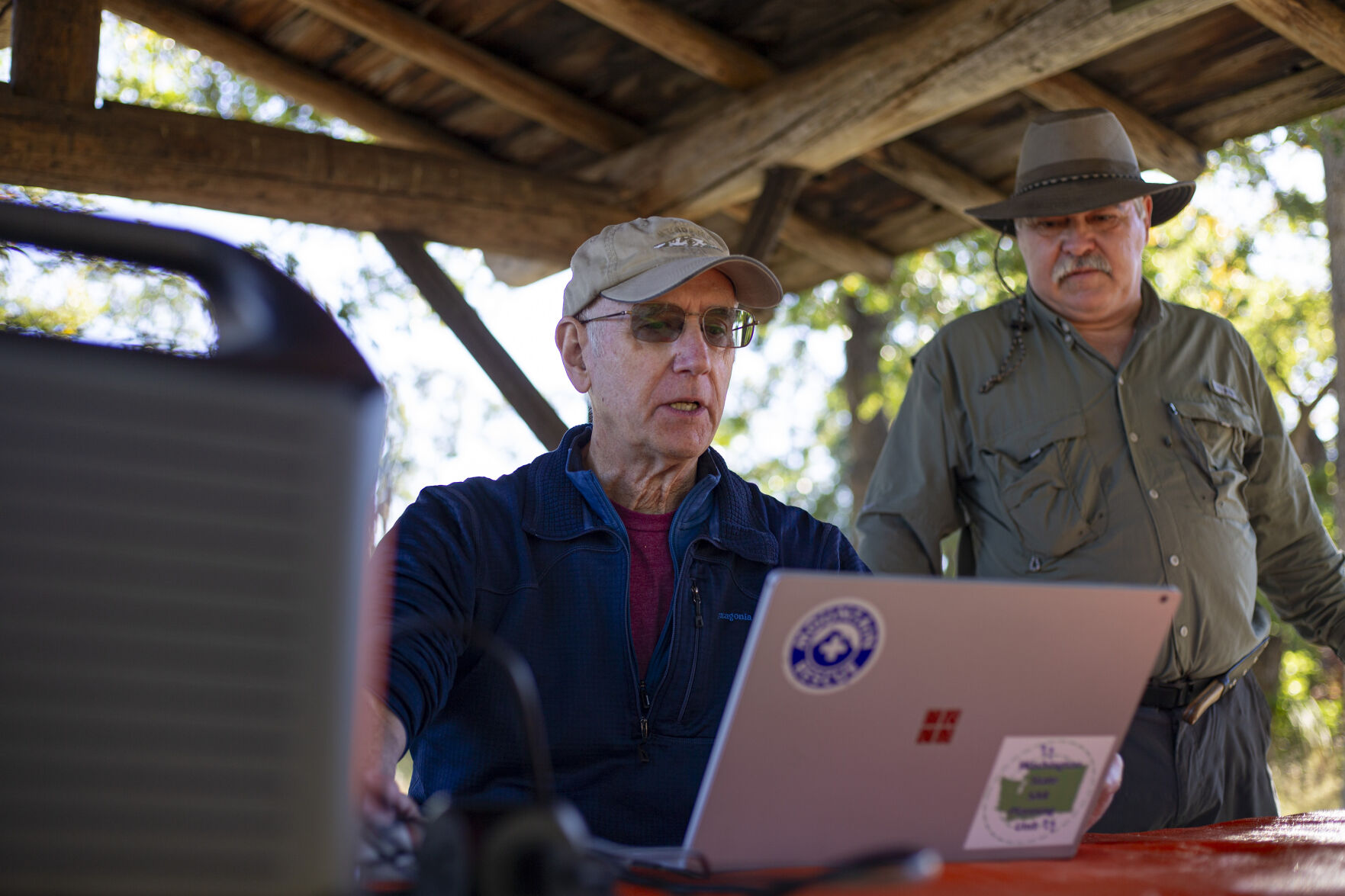 Guy Mansfield, with the Washington State Search And Rescue Planning Unit, uses high-tech mapping systems on a laptop at Fort Simcoe Historical State Park in search of hidden remains.