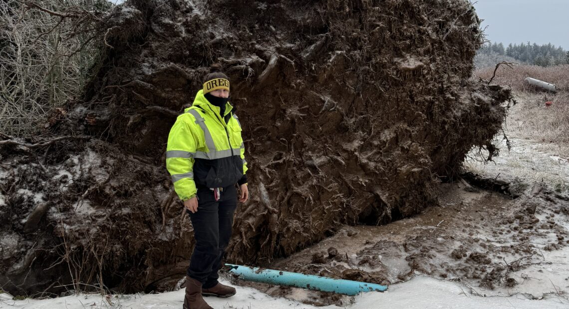 nd icy conditions over the past several days, utility workers, like Alivia Pence, struggled to keep the taps on in Corbett, Oregon. (Credit: Steve Young)