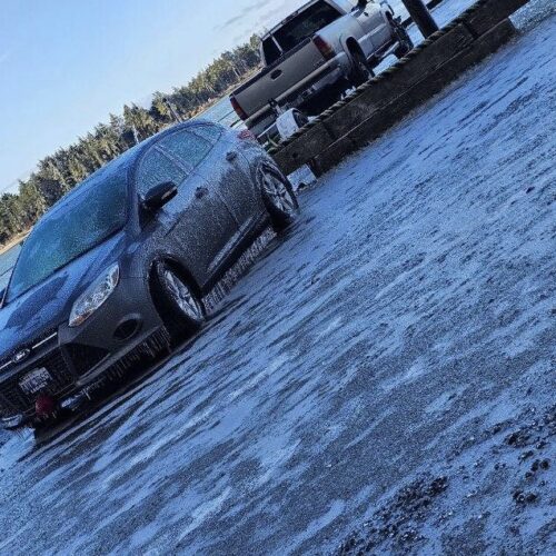 An icy parking lot near Brighton, Oregon. Many people have fallen, or had pipes burst in the cold and icy weather.