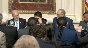 Federal, state and tribal leaders officially signed an agreement Friday to better protect salmon in the Columbia River and halt court cases for the next 10 years. (Credit: White House livestream)
