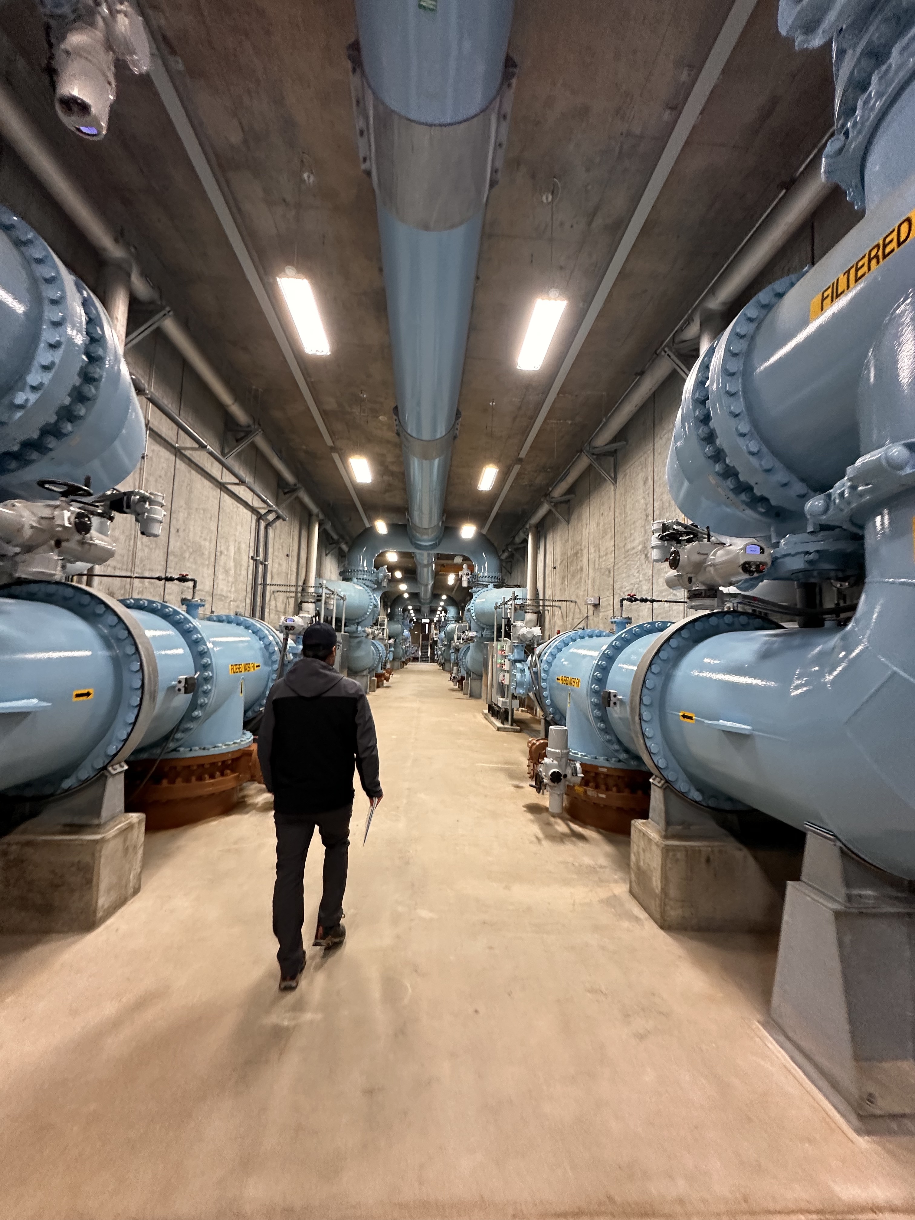 Filtered water runs through huge pipes at Tacoma Water headworks. (Credit: Lauren Gallup / NWPB)