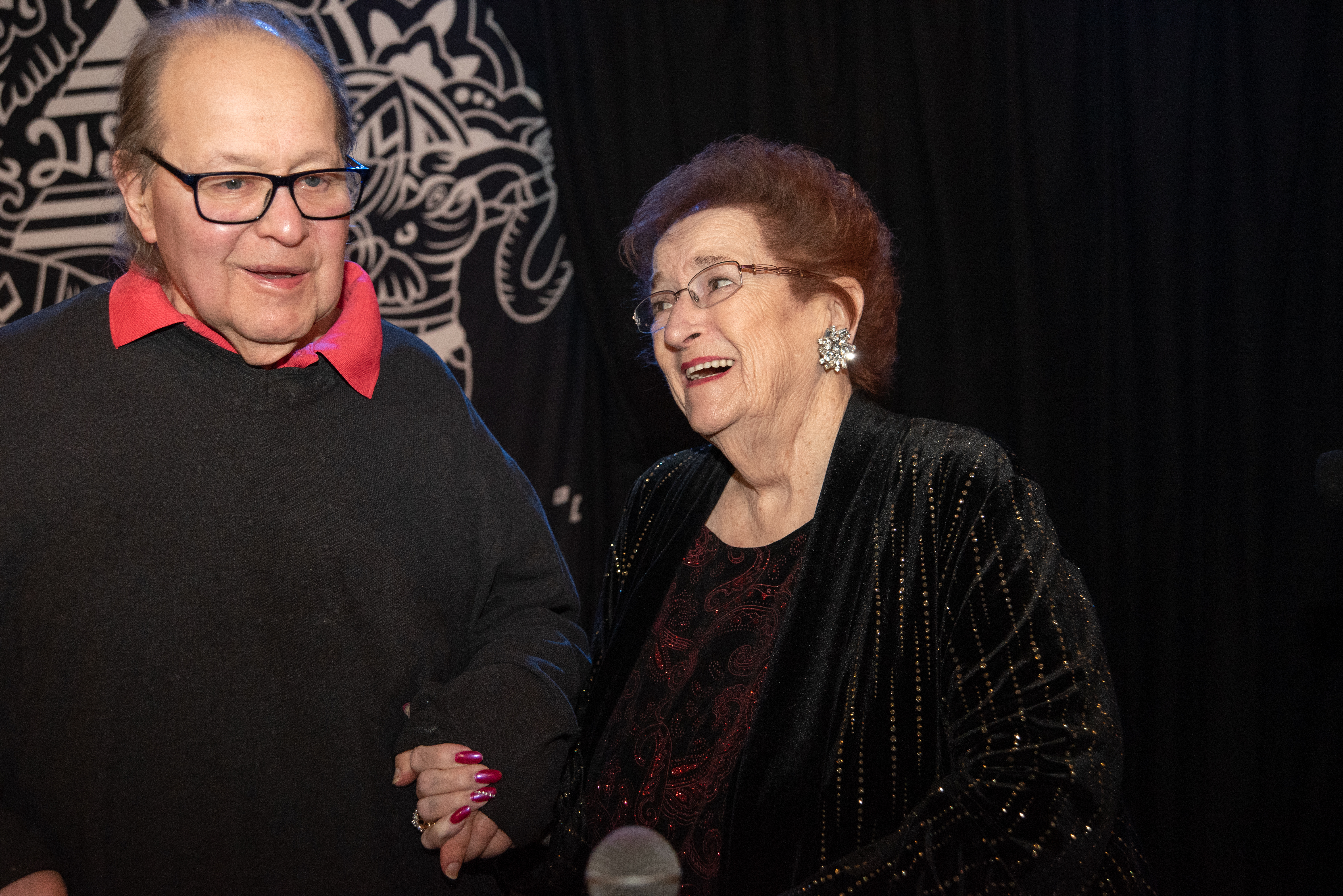 Longtime musical collaborators singer Mary Lou Gnoza and pianist Stevie Haberman enjoy a laugh as they stand for a portrait between sets at their monthly performance at The Emerald of Siam in Richland, Washington. 