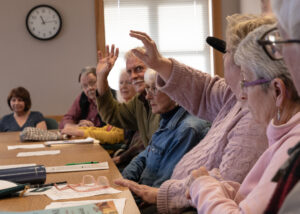 At the Port Angeles Senior and Community Center, a group of community members meets up every Thursday morning to talk politics. On March 14, the Thursday following Washington state's presidential primary elections, the place was filled with voices eager to discuss presidential politics. (Credit: Tela Moss / NWPB)