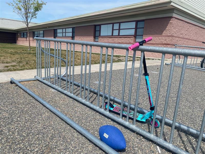 Children’s scooters, bikes and toys were left behind in the evacuation at William Wiley Elementary School Monday after a paraeducator was shot and killed by her ex-husband during dismissal Monday afternoon. 