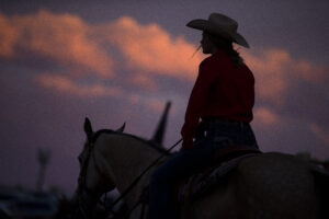 The sun sets on Friday, June 17, 2022, at the Freedom Rodeo in Basin City.