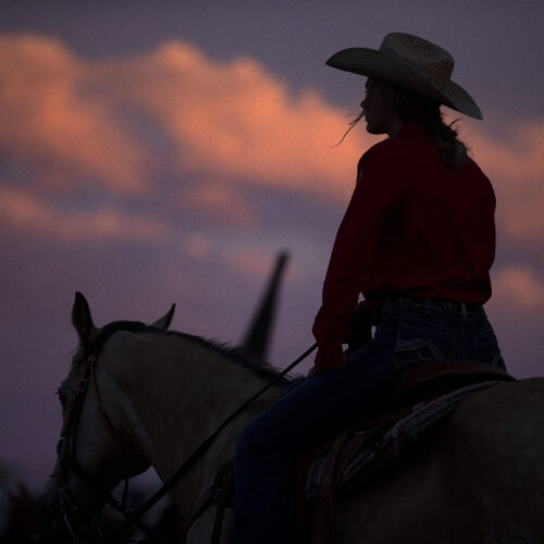 The sun sets on Friday, June 17, 2022, at the Freedom Rodeo in Basin City.