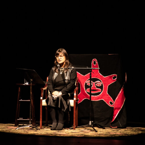 Heather Jefferson, Lhaq’temish (Lummi) Nation, part of "The Aunties: Women of the Salish Sea" at Mount Baker Theatre in Bellingham, Washington, on Nov. 11, 2023. (Credit: Mark Caicedo / Indigenous Performance Productions, ArtsFund)