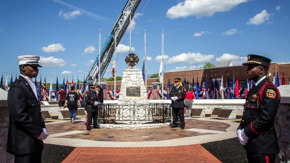 Honor guards stand watch at the National Firefighters Memorial Weekend