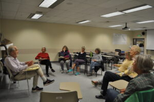Pat Henry teaches a Quest class about religious activism in the 1960s. (Courtesy Of Annaliese Baker)