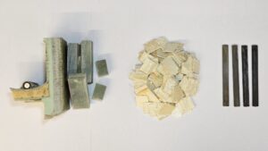 Researchers have found a way to recycle wind turbine blades with the resulting leftovers: Pictured from left to right, Wind turbine blade waste; treated and dried wind turbine blade glass fiber-reinforced polymer (GFRP); injection-molded plastic containing 70% recycled GFRP (Courtesy: Washington State University)