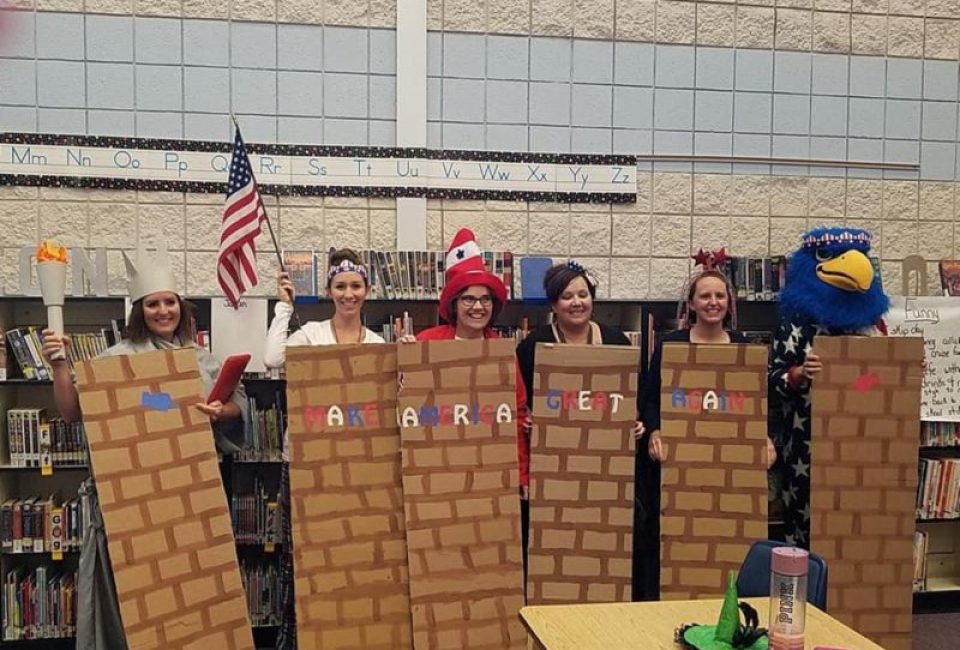 In another photo put on social media by the Middleton School District, educators can be seen posing with segments of a wall emblazoned with "Make America Great Again." CREDIT: FACEBOOK